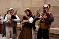 Vigo, Galicia, Spain, March 26 2022: Three bag pipers play celtic music in a history festival in Vigo