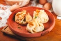 Three bags of thin pancakes with filling. Traditional Maslenitsa Shrovetide or Butter Week festival meal