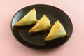 Three Baked Spanakopita pastry appetizers