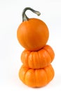 Three balanced mini pumpkins Royalty Free Stock Photo