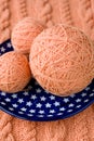 Three ball of pink yarn