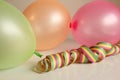 Three balloons and a piece of serpentine
