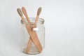 bamboo tooth brushes in a glass jar on a white background, copy space Royalty Free Stock Photo