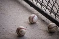 Three Baseballs in the Dugout