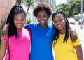 Three beautiful african american girlfriends in the city Royalty Free Stock Photo