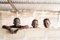 Three Beautiful African Girls and Boys Posing Smiling at Camera Laughing and Having Fun Royalty Free Stock Photo