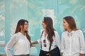 Three beautiful businesswomen talking outside Royalty Free Stock Photo