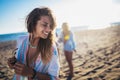 Beautiful girls having fun on the beach Royalty Free Stock Photo