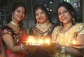 Beautiful indian women celebrate Diwali