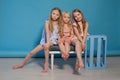 Three beautiful little girls dresses fashion portrait sisters Royalty Free Stock Photo