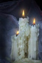 three beautiful old candles.