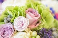 Three beautiful roses in different pink colors in a flower bouquet Royalty Free Stock Photo