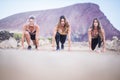 Three beautiful runner girls young ready to start and run for hard workout and fitness outdoor activity. build your new and strong