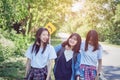 Three beautiful woman relaxing and walks her neck and laughs to travel.