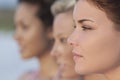 Three Beautiful Young Women In Profile