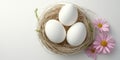 Three beautifully decorated eggs nestled in a floral arrangement on a white surface, symbolizing the joy of Easter Royalty Free Stock Photo
