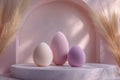 Three pastel beauty blending sponges arranged on a soft pink surface with gentle light Royalty Free Stock Photo