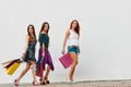 Three beauty sisters with Shopping Bags Royalty Free Stock Photo