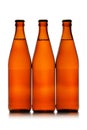 Three beer bottles in a row Royalty Free Stock Photo