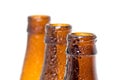 Three beer bottles tops with water drops 2 Royalty Free Stock Photo