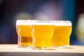 Three beer glasses on the bar counter Royalty Free Stock Photo