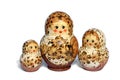 Three beige and brown matrioshkas