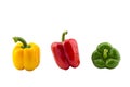 Three bell peppers yellow red green isolated on white background Royalty Free Stock Photo