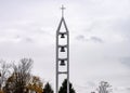 three bells against the sky