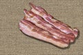 Pork Belly Bacon Rashers Set On Burlap Canvas Coarse Surface Royalty Free Stock Photo