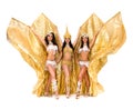 Three belly dancers with golden wings Royalty Free Stock Photo