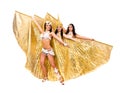 Three belly dancers with golden wings