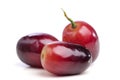 Three berries of red grapes close up. Royalty Free Stock Photo