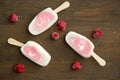 Popsicle with fresh raspberry on a table Royalty Free Stock Photo