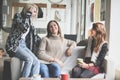 Three best friends. Young women having conversation. Royalty Free Stock Photo