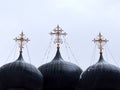 Three big domes on top of the christian church on the white background