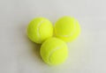 Three big tennis balls on white background. Sport concept Royalty Free Stock Photo