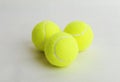 Three big tennis balls on white background. Sport concept Royalty Free Stock Photo