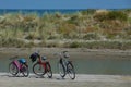 Three bikes on a beach