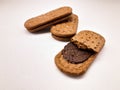 three biscuits with chocolate cream Royalty Free Stock Photo