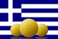 Three Bitcoins cryptocurrency with Grecia flag on background