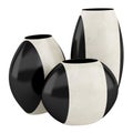 Three black and beige ceramic vases isolated on white