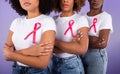 Three Black Ladies Posing With Pink Cancer Ribbons, Studio Shot