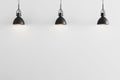 Three black pendant light on white wall background, ceiling lights, white wall with pendant lights mockup, 3d rendering Royalty Free Stock Photo