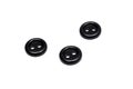 Three black plastic buttons, isolate on a white background Royalty Free Stock Photo