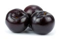 Three black plums, on white background Royalty Free Stock Photo