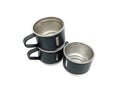Three black stainless steel mugs arranged in a pyramid-like stack on a white background. Royalty Free Stock Photo