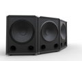 Three black subwoofer speakers Royalty Free Stock Photo