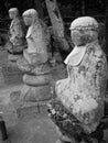 Three black-and-white Buddha images