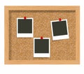 Three blank frame photo prints, cork notice board. Blank instant photo pinned to a cork board. Royalty Free Stock Photo