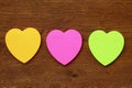 Three blank heart shaped stickers with space for text. Creative symbolic background Royalty Free Stock Photo